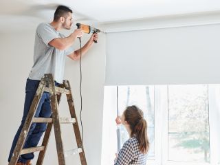 Skilled Technicians Repairing Window Coverings in San Mateo